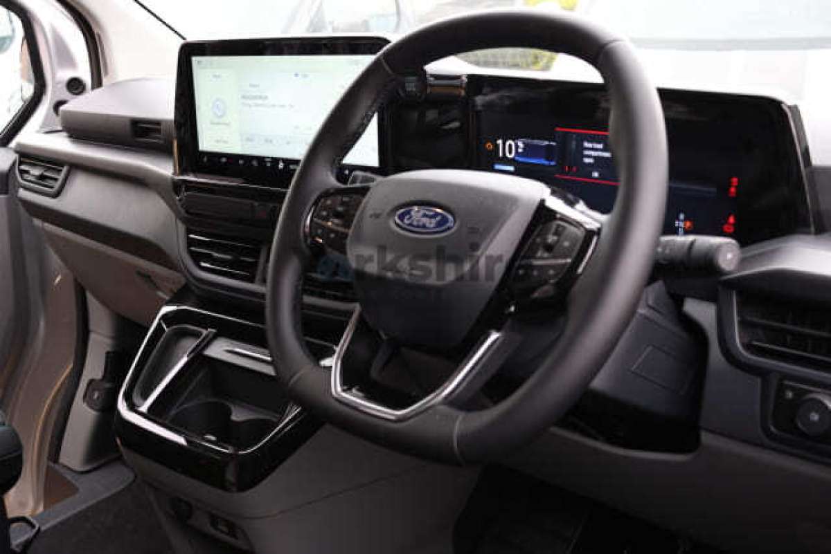 This is the Transit 320 Custom L1H1 DCiV Sport Hybrid vehicle.